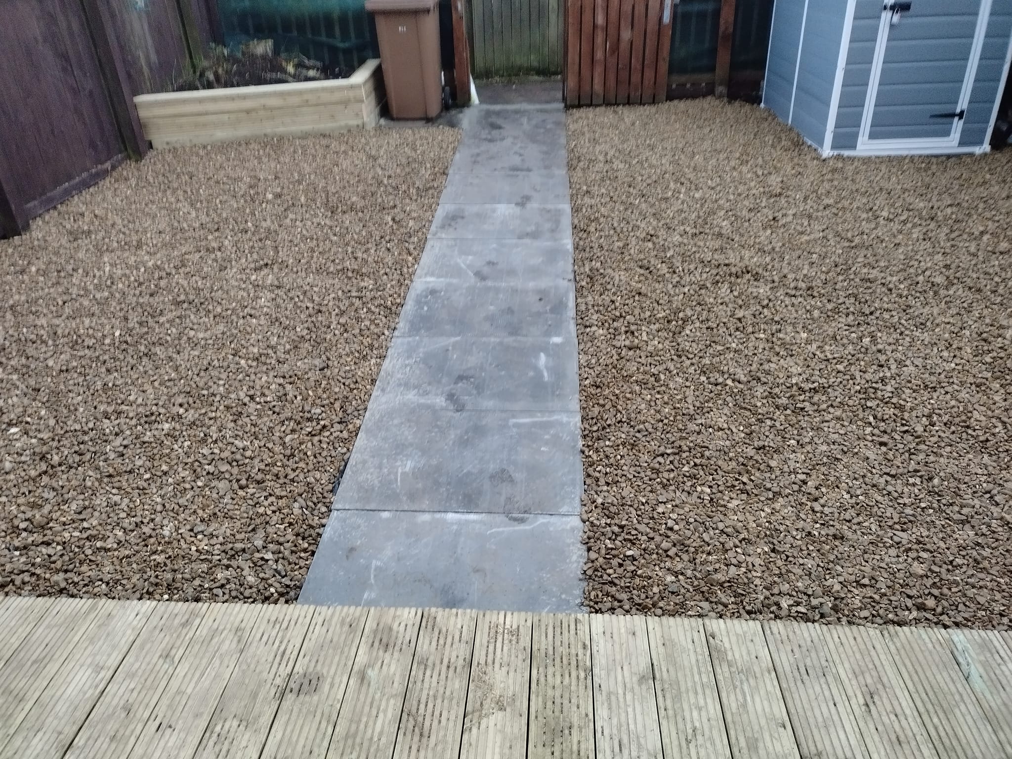 Concrete slab walkway to back garden gate